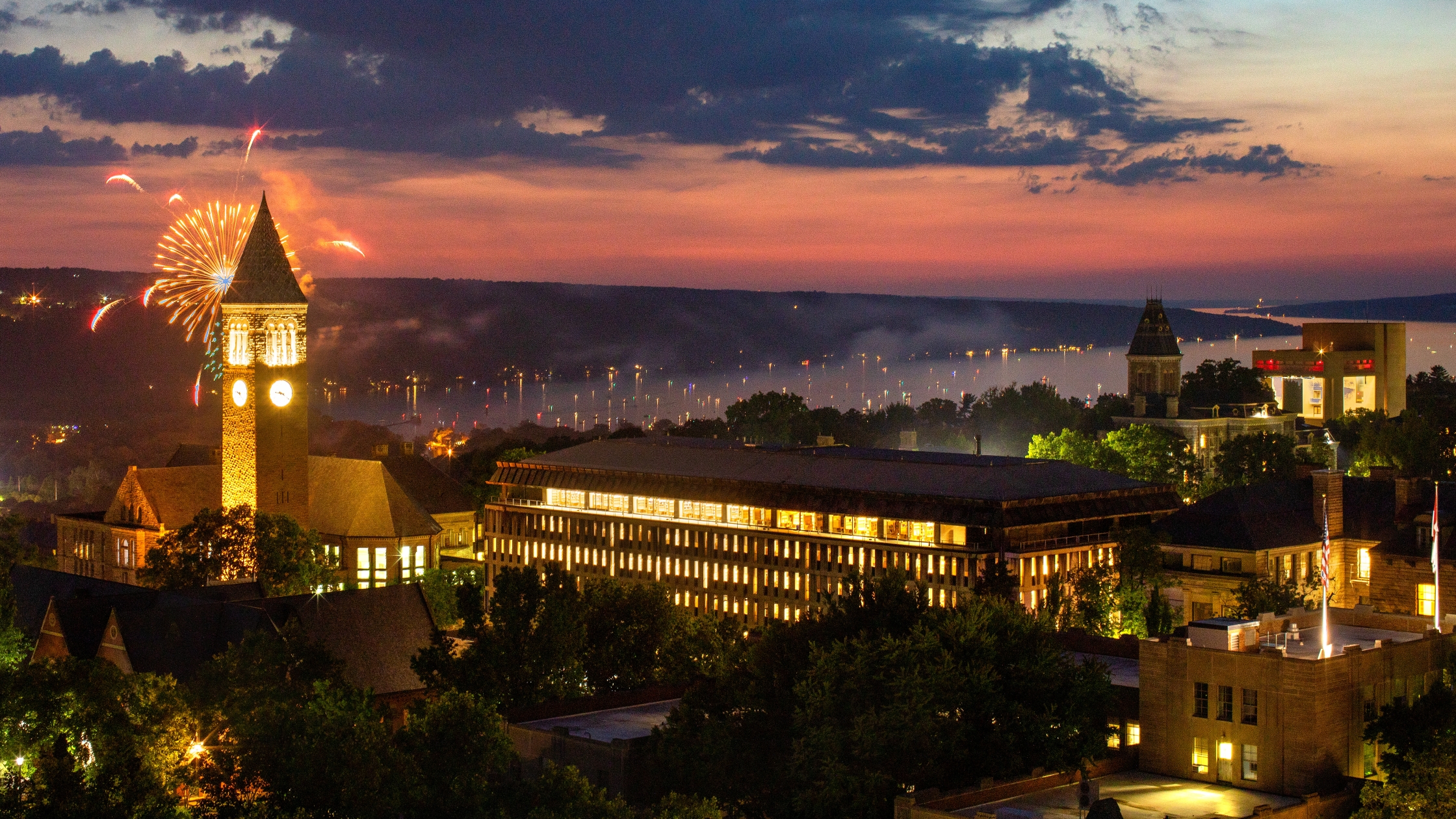 Fireworks over Cornell Campus with Cayuga Lake in background